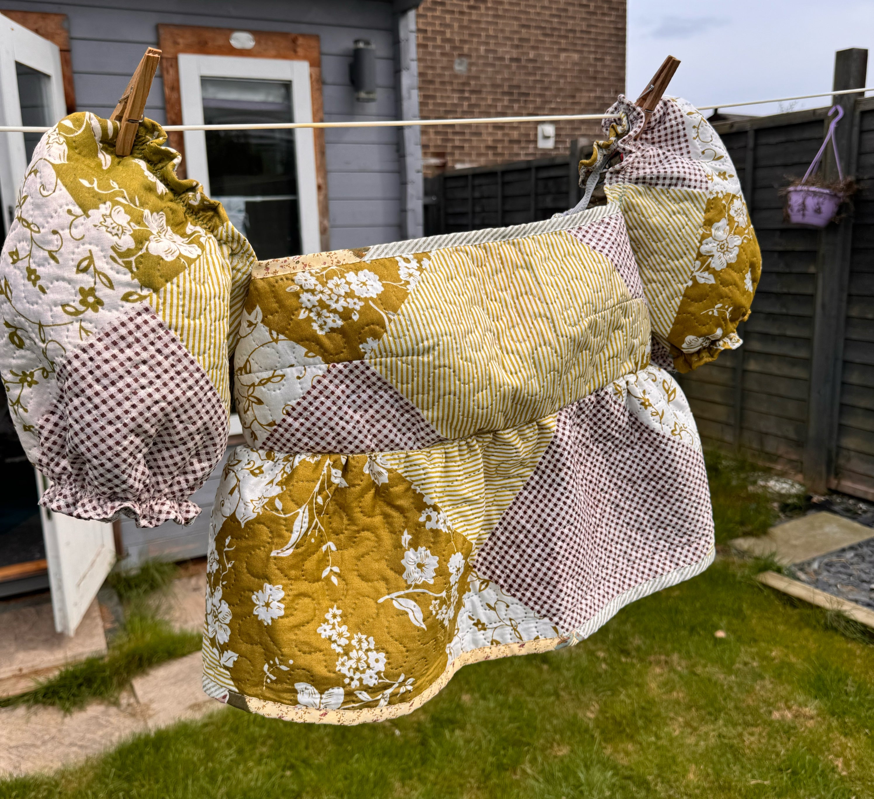 Quilted puff sleeve top in olive patchwork UK10-12