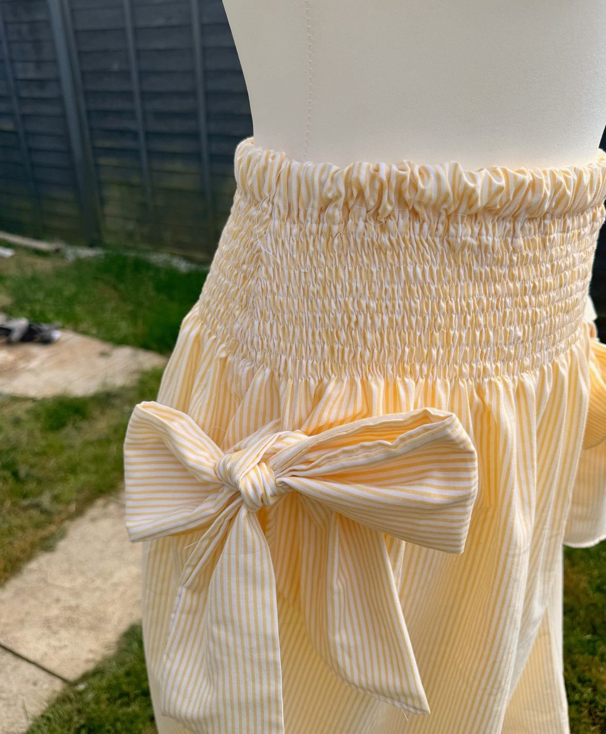 Shirred waist bow hip skirt in lemon stripe UK10-16