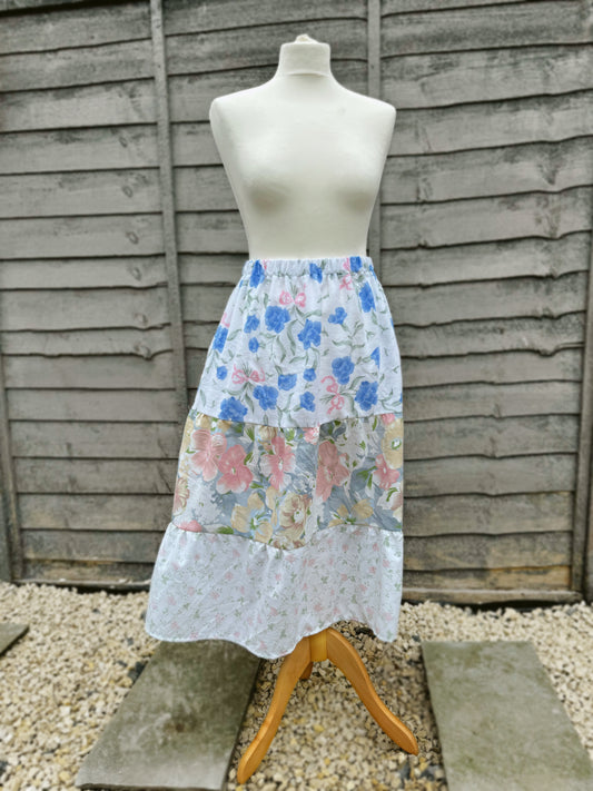 Made to order pattern clash midi skirt